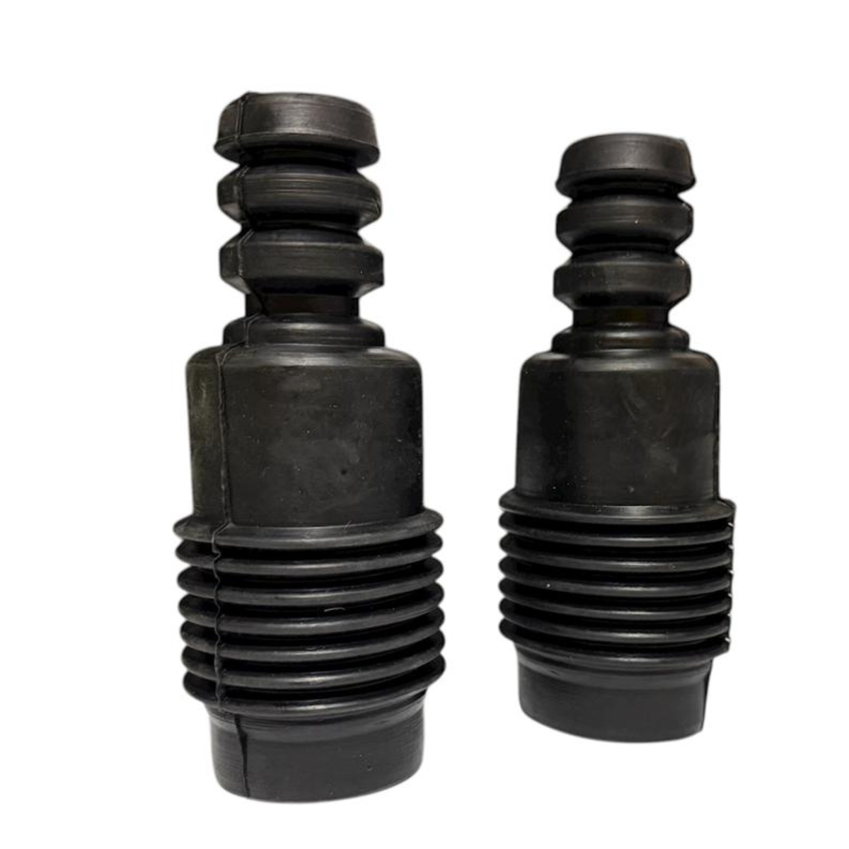Par de topes de rebote delanteros para Ford Courier 2000-2012, fabricados en hule negro de alta resistencia.